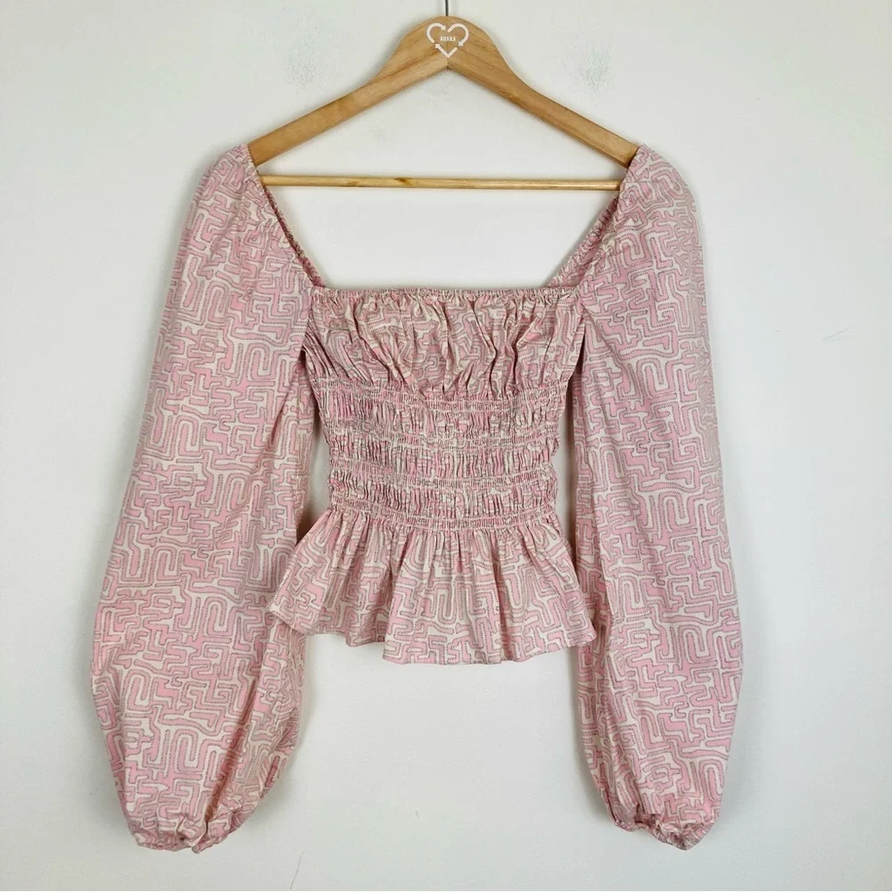 STAUD Jules smocked puff-sleeve peplum top in pink & cream 